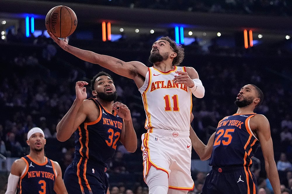 |Photo: AP/Frank Franklin II : NBA Cup Quarter-Final: Hawks' Trae Young (11) drives past New York Knicks' Mikal Bridges