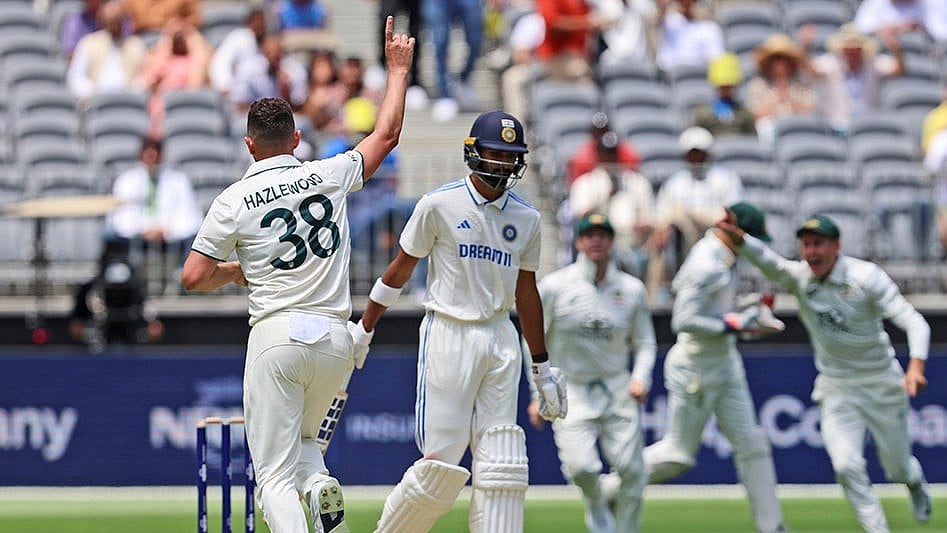 IND Vs AUS 1st Test, Day 1: Australia's Josh Hazlewood celebrates the wicket of India's Devdutt Padikkal - | Photo: AP/Trevor Collens