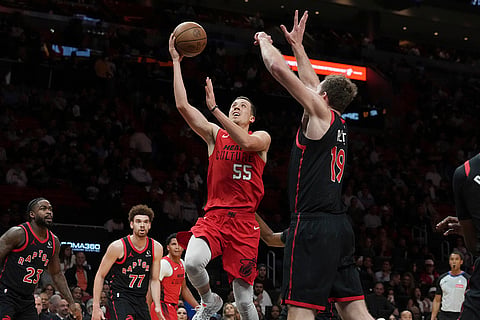 NBA: Heat forward Duncan Robinson drives to the basket