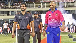 Special arrangement : Shikhar Dhawan with Suresh Raina during Big Cricket League.