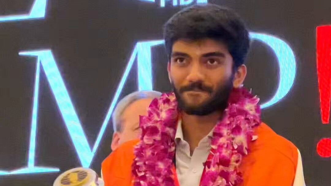 D Gukesh lifts the FIDE World Chess Championship trophy