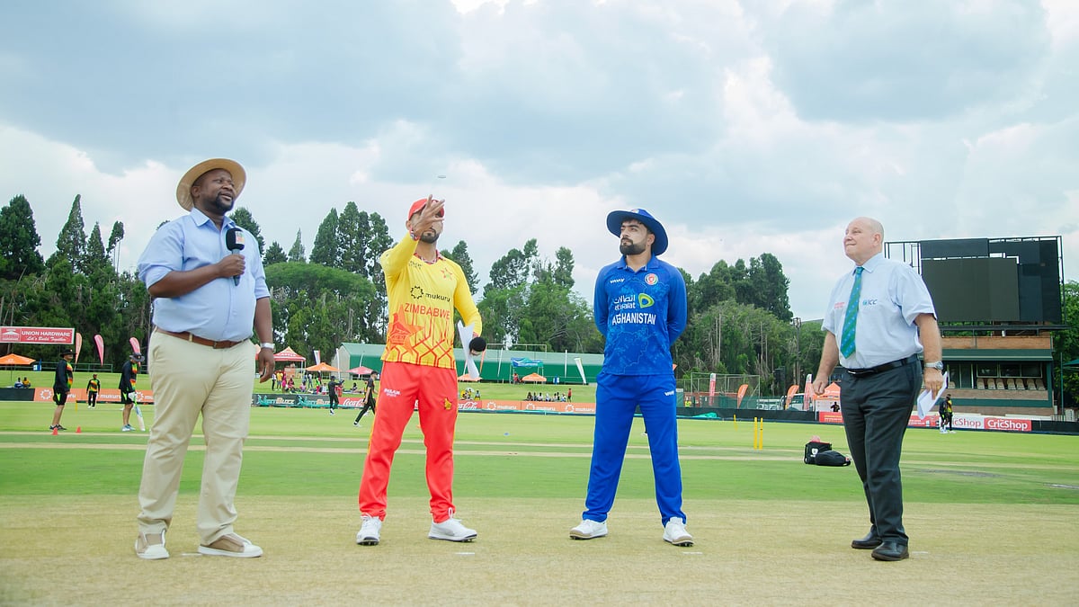 X/Afghanistan Cricket Board : Captains Rashid Khan and Sikandar Raza at the toss for the third and final T20I in Harare.
