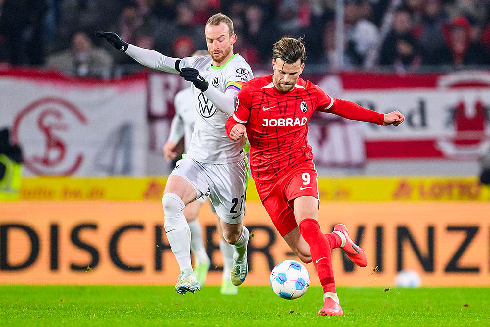 Germany Soccer Bundesliga 2024-25 SC Freiburg and VfL Wolfsburg football pics: Maximilian Arnold