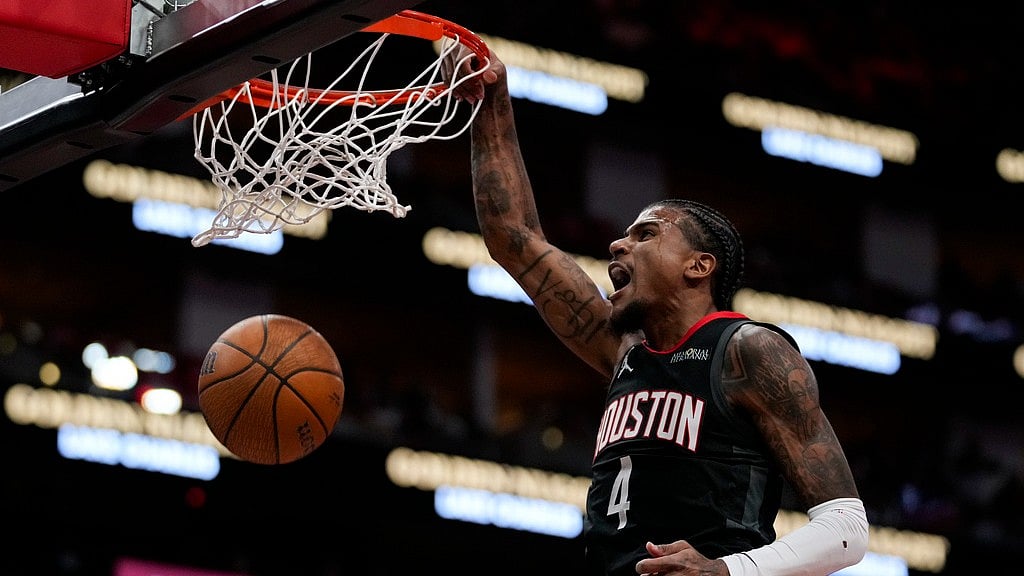 AP Photo/Ashley Landis : Houston Rockets guard Jalen Green dunks during the first half of an Emirates NBA cup tournament quarterfinal basketball game against the Golden State Warriors in Houston, Wednesday, Dec. 11, 2024. 
