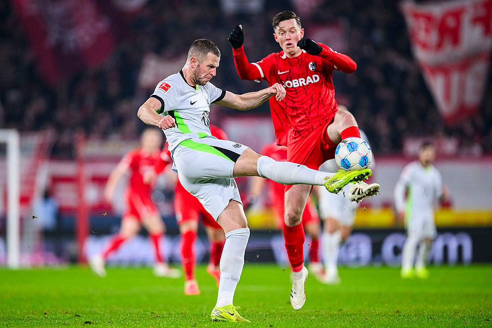 Germany Soccer Bundesliga 2024-25 SC Freiburg and VfL Wolfsburg football match pics: Tiago Tomas