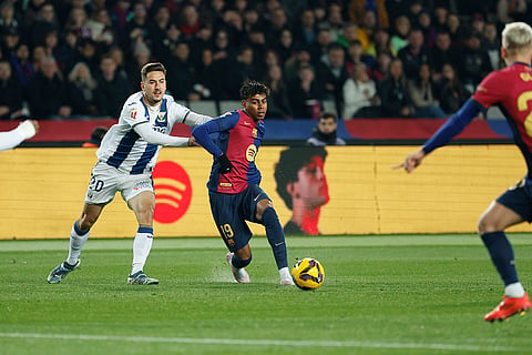 La liga 2024-25: Barcelona's Lamine Yamal and Leganes' Javi Hernandez challenge for the ball 