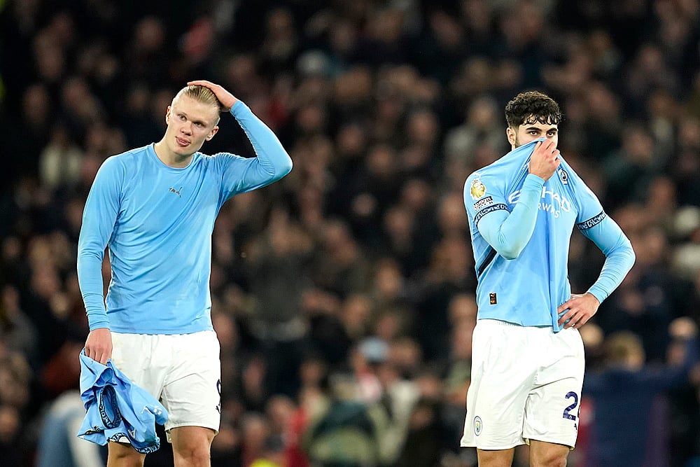 | Photo: AP/Dave Thompson : EPL 2024-25: Manchester City's Erling Haaland Josko Gvardiol react disappointed after the match