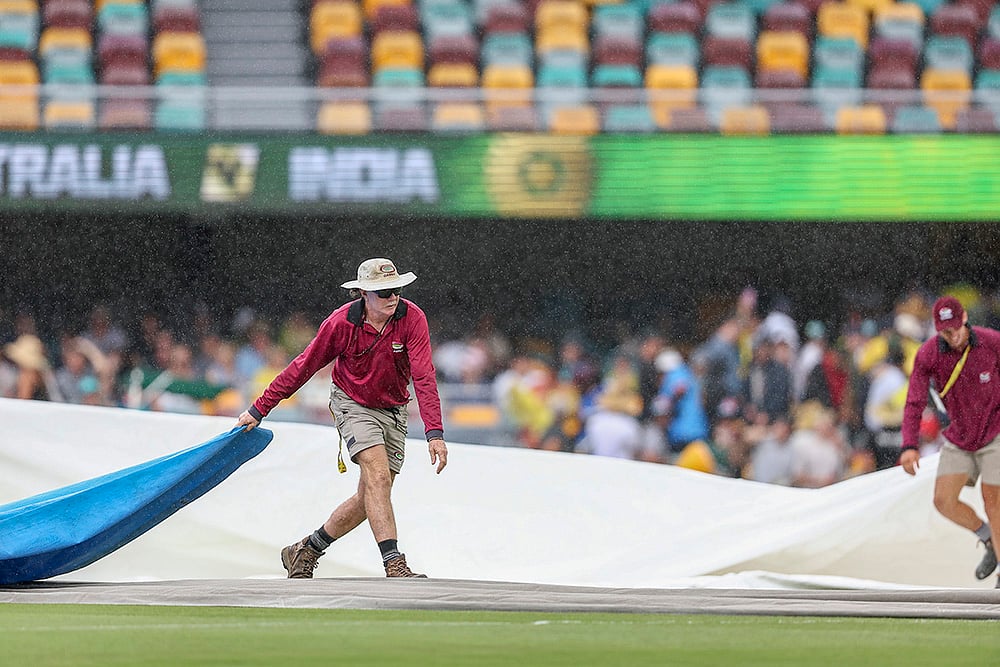 Border-Gavaskar cricket series at Gabba in Brisbane IND Vs AUS 3rd Test Day 3 Pics: Rains