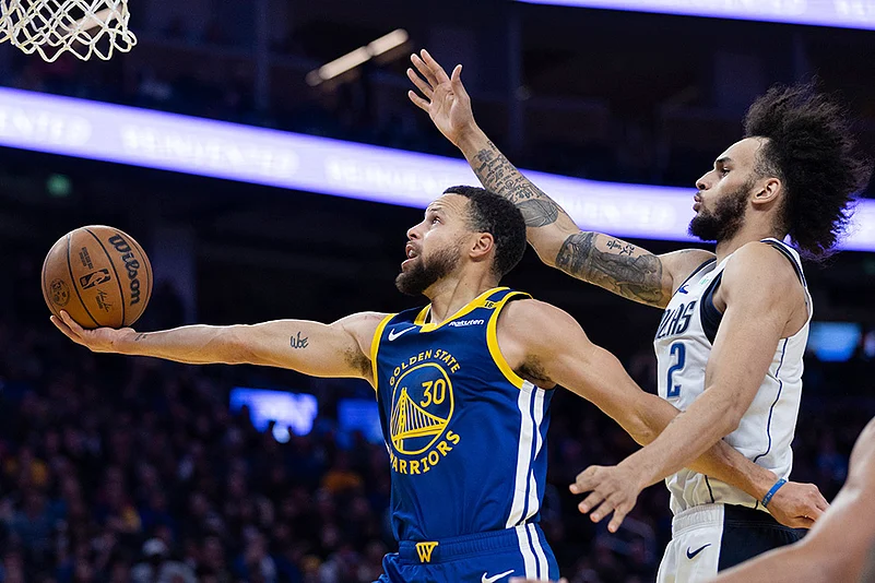 NBA 2024-25 Golden State Warriors vs Dallas Mavericks basketball game photos: Stephen Curry