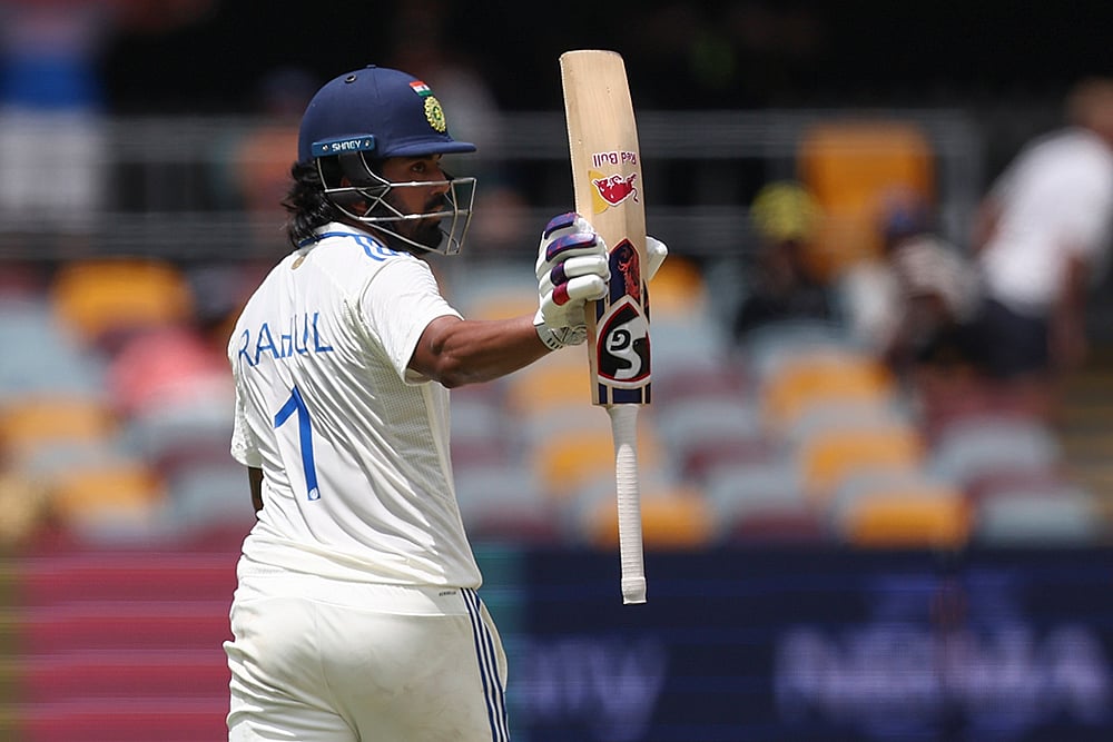| Photo: AP/Pat Hoelscher : India Vs Australia, 3rd Test Day 4: India's KL Rahul reacts on reaching 50 runs 