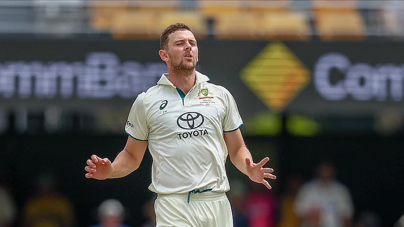 Australias Josh Hazlewood reacts after bowling a delivery. AP Photo