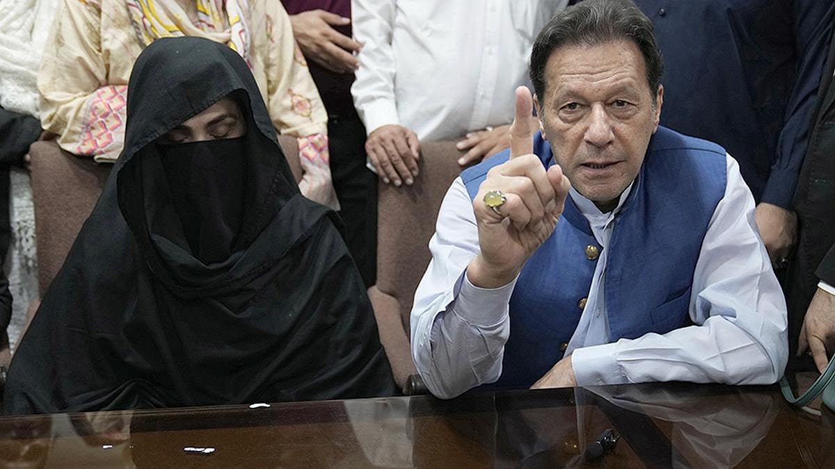 AP : Ex-Pakistan PM Imran Khan with his wife Bushra Bibi