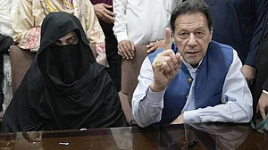 AP : Ex-Pakistan PM Imran Khan with his wife Bushra Bibi