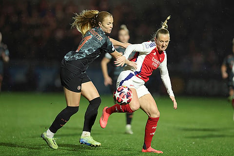 Women's Champions League: Arsenal's Stina Blackstenius, right vies for the ball with Bayern Munich's Glodis Perla Viggosdottir 