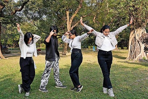 Korean Influence: Members of “Bongo BTS” practicing Korean dance at a park in Kolkata