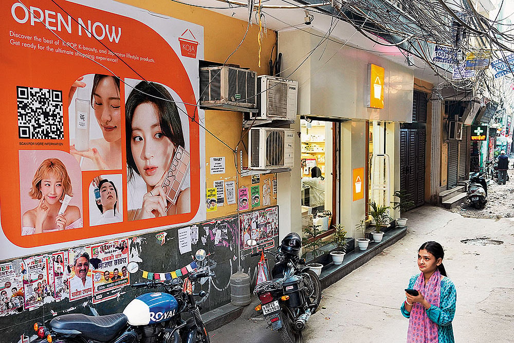 | Photo: Suresh K. Pandey : A poster for Korean beauty products in Humayunpur