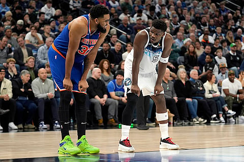 NBA: Knicks center Karl-Anthony Towns (32) and Timberwolves guard Anthony Edwards