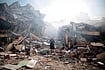 | Photo: Getty Images : All That Remains: A resident walks through the rubble of residential buildings after Israeli air-strikes in Gaza Strip on October 19, 2023