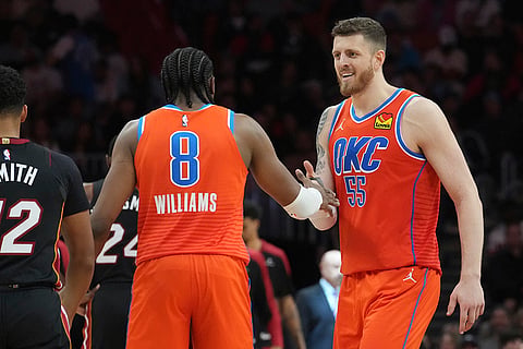 NBA 2024-25: Thunder forward Jalen Williams (8) and center Isaiah Hartenstein (55) celebrate