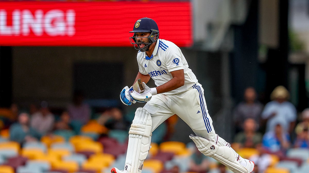 India's captain Rohit Sharma bats during play on day three of the third cricket test between India and Australia at the Gabba in Brisbane. - AP Photo/Pat Hoelscher