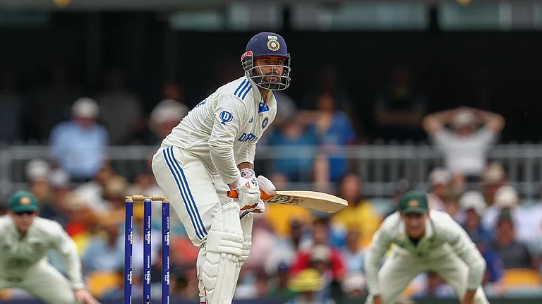 India's Rishabh Pant bats during play on day three of the third cricket test between India and Australia at the Gabba in Brisbane. - AP Photo/Pat Hoelscher