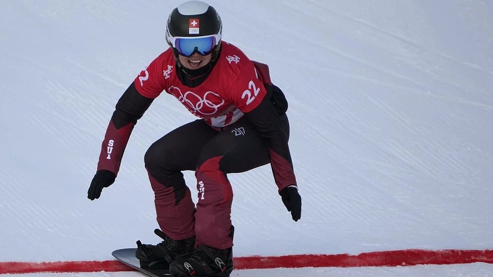 Switzerland’s Sophie Hediger competes during the women’s snowboard cross qualification round at the 2022 Winter Olympics. - File/AP