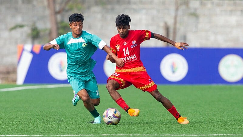 AIFF/Parthibhan R : Odisha team player (in red) in action at the Santosh Trophy 2024-25 tournament.