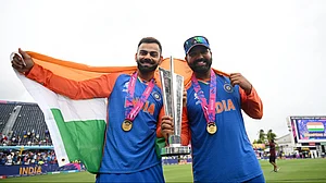 Photo: X | BCCI : Indian batters Rohit Sharma and Virat Kohli with the ICC T20 World Cup 2024.