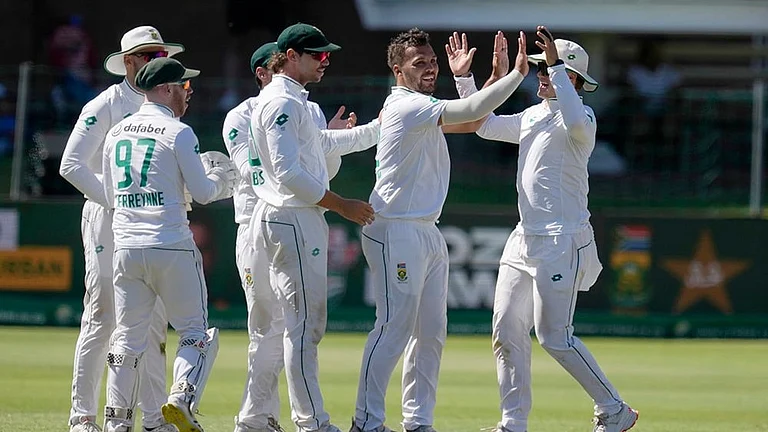South Africa's Dane Paterson celebrates with his teammates - | Photo: AP/Themba Hadebe