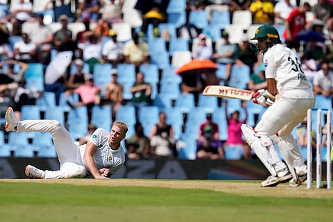 SA vs PAK 1st Test Day 1:  South Africa's Corbin Bosch, left, falls down after his delivery