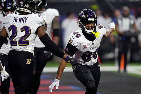 NFL Football: Ravens tight end Isaiah Likely (80) celebrates after catching a 9-yard touchdown pass