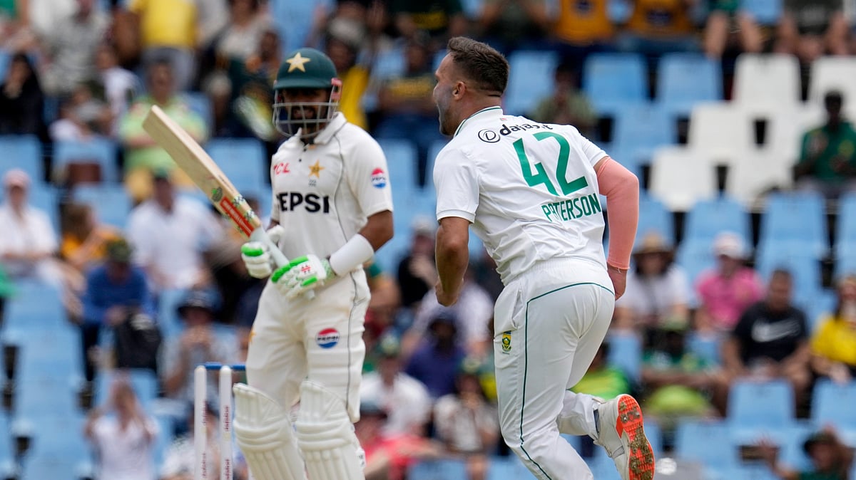 AP Photo/Themba Hadebe : South Africa's Dane Paterson, celebrates after dismissing Pakistan's Babar Azam.