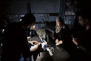 | Photo: Getty Images : Dire Times: Doctors at Kemal Adwan Hospital in Gaza are forced to work in the dark due to the electricity crisis in Gaza City