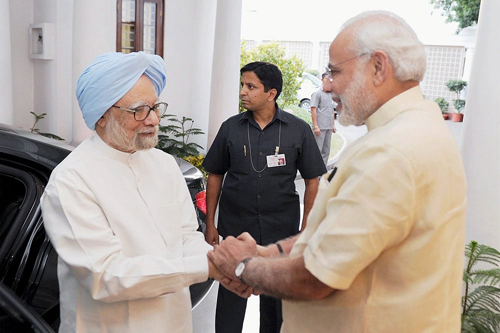 Manmohan Singh with Narendra Modi