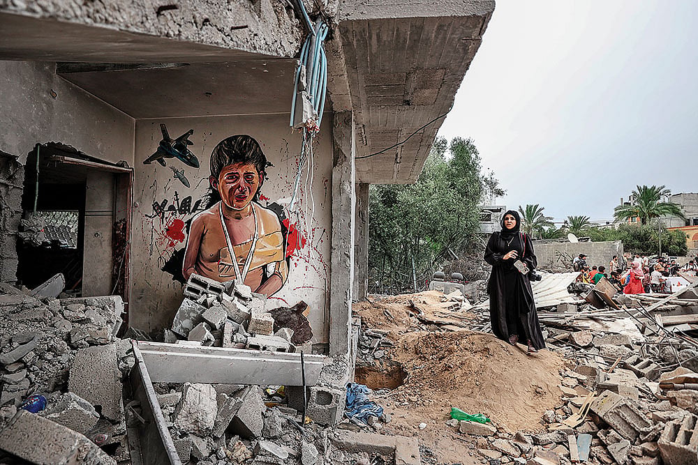 Photo: Getty Images : Living without a mobile phone, this family has no pictures of little Sila — just a few of her clothes and memories from the last three weeks.