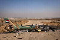 Liberating Levant: The Syrian Saga Is Yet To Unfold Photo: Getty Images : Shot Down: A Syrian Air Force helicopter is destroyed after Israeli
strikes against military targets across Syria in December