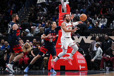 NBA: Knicks guard Jalen Brunson (11) passes the ball