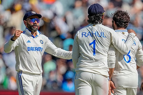 India Vs Australia, 4th Test Day 4: Ravindra Jadeja, right, KL Rahul and Virat Kohli celebrate Pat Cummins wicket 