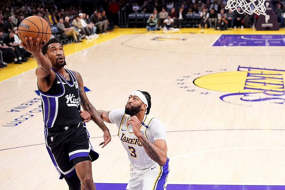 NBA 2024-25 Los Angeles Lakers vs Sacramento Kings basketball game pics: Malik Monk 