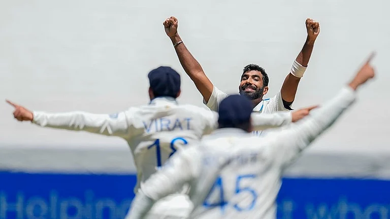 India Vs Australia, 4th Test Day 4: Jasprit Bumrah celebrates after the dismissal of Australia's Travis Head - | Photo: AP/Asanka Brendon Ratnayake