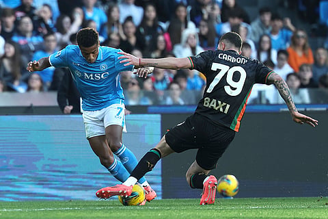 Serie A 2024-25: Napoli's David Neres Campos and Venezia's Franco Carboni in action