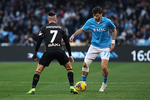 Serie A 2024-25: Napoli's Khvicha Kvaratskhelia and Venezia's Francesco Zampano in action