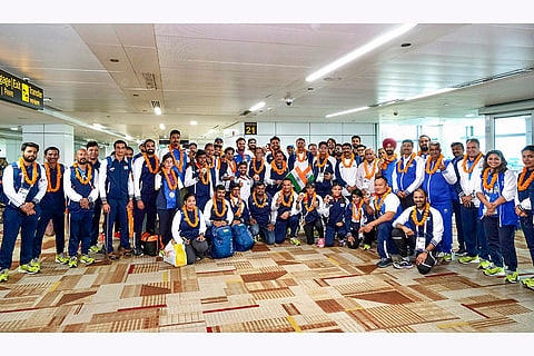 Paraathletes are greeted upon their arrival back in India.