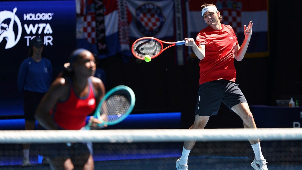 AP : Taylor Fritz and Coco Gauff of the United States in action at the United Cup.