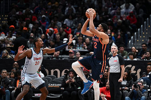 NBA 2024-25: Knicks center Karl-Anthony Towns shoots the ball