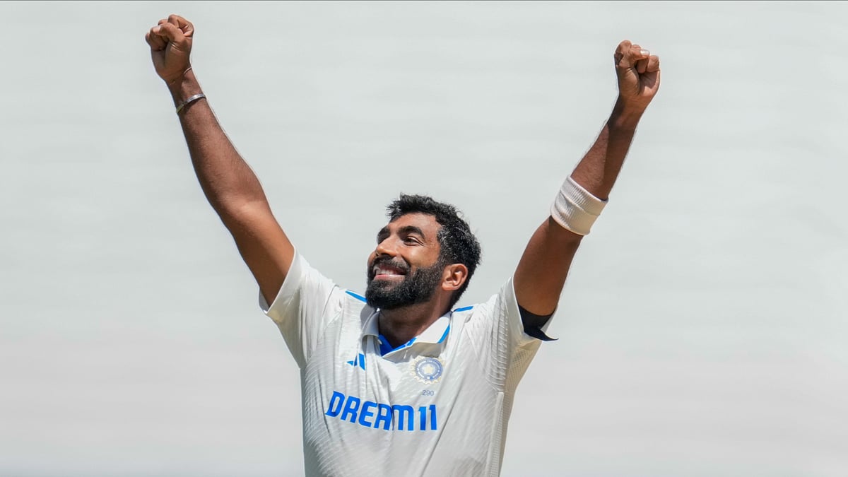 India's Jasprit Bumrah celebrates the wicket of Australia's Travis Head during play on day four of the fourth cricket test between Australia and India at the Melbourne Cricket Ground, Melbourne. - AP Photo/Asanka Brendon Ratnayake