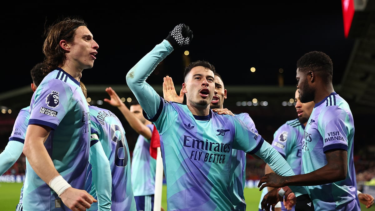 Gabriel Martinelli celebrates after scoring Arsenal's third goal against Brentford - null