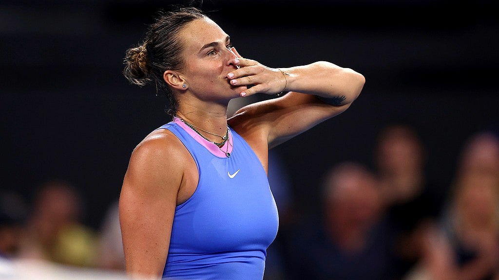 AP/Pat Hoelscher : Aryna Sabalenka celebrates winning her match against Kazakhstan's Yulia Putintseva, at the Brisbane International in Brisbane.