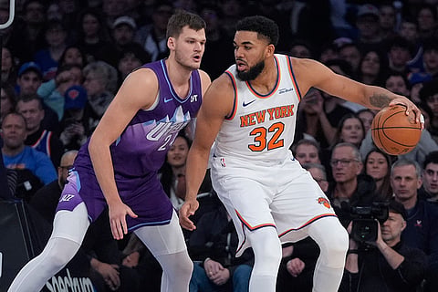 NBA 2024-25: Jazz's Walker Kessler (24) defends Knicks' Karl-Anthony Towns 