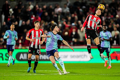 EPL 2024-25: Brentford's Mathias Jensen heads the ball